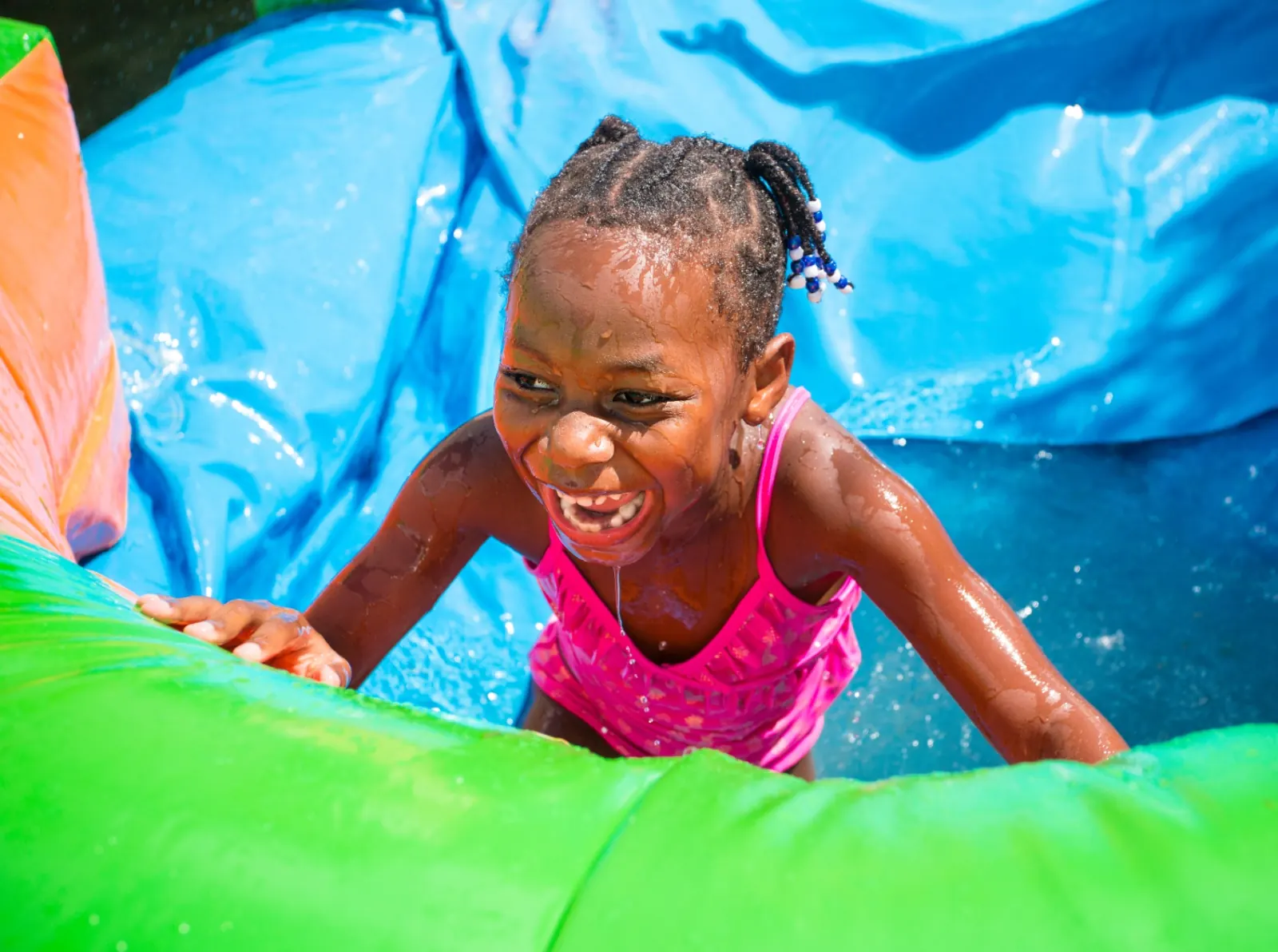 Kids enjoying a water slide rental in Orlando